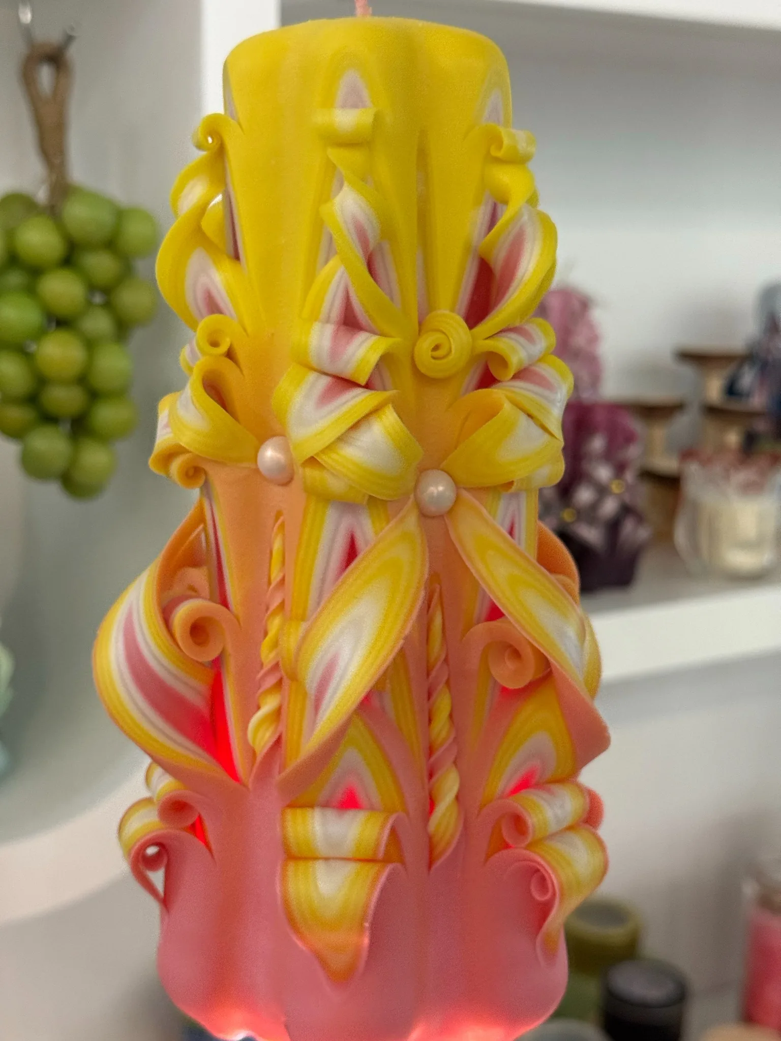 Bow detail carved candle pink and yellow detail