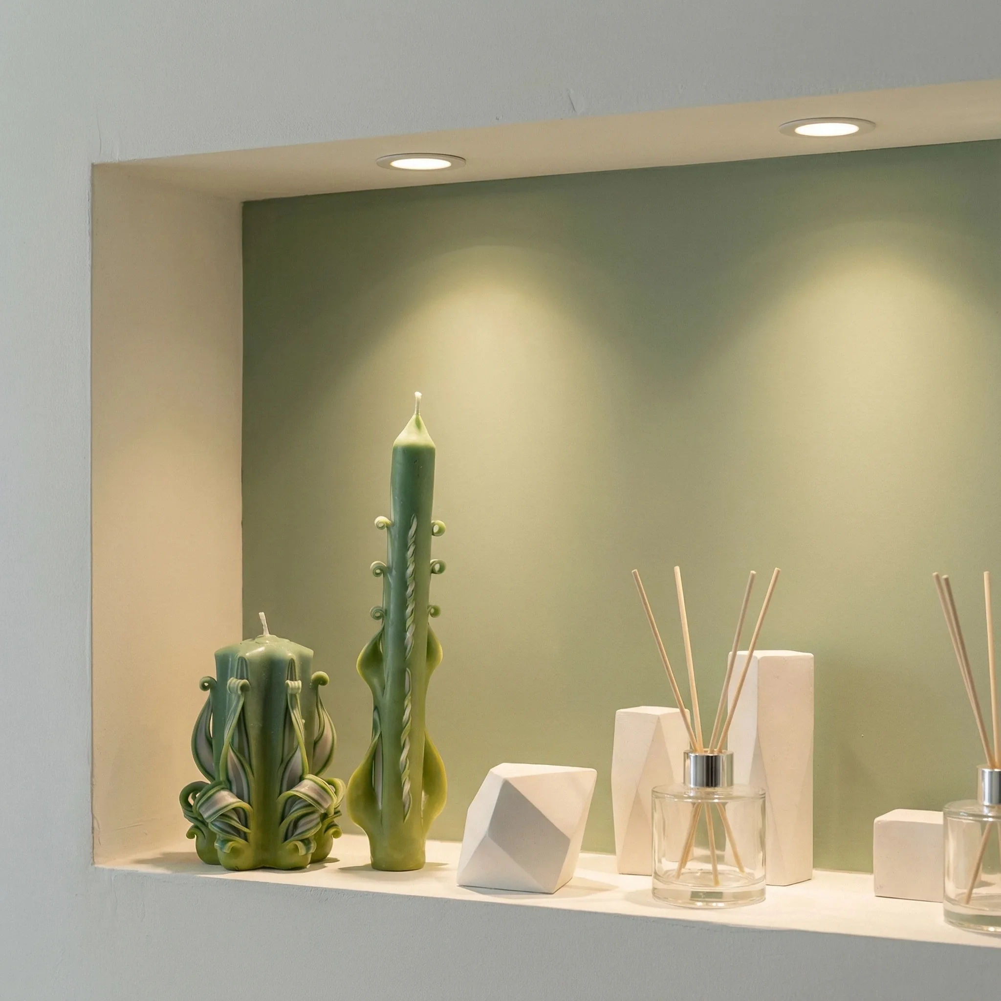 Hand-carved candle duo set shelf display