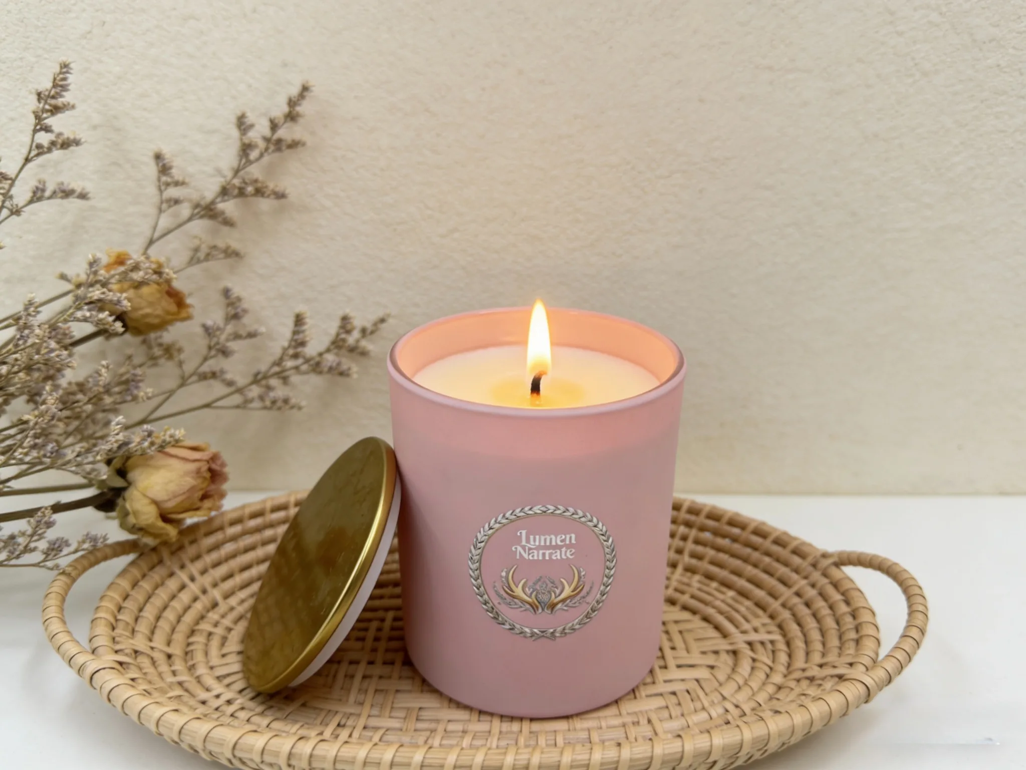 Matte pink glass candle close-up